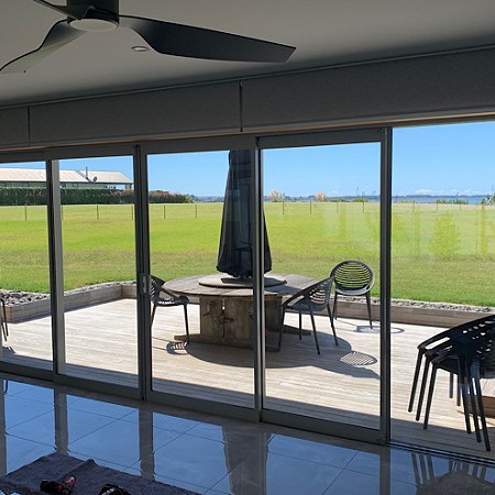 Blockout Roller Blinds Over Large Sliders
