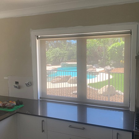 Sunscreen Roller Blind Over Looking Pool