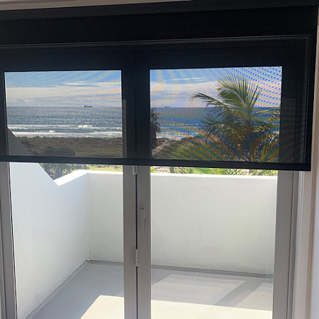Sunscreen Blind Over Looking Beach