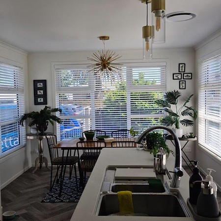 White Venetian Blinds Add Fresh Light To This Space